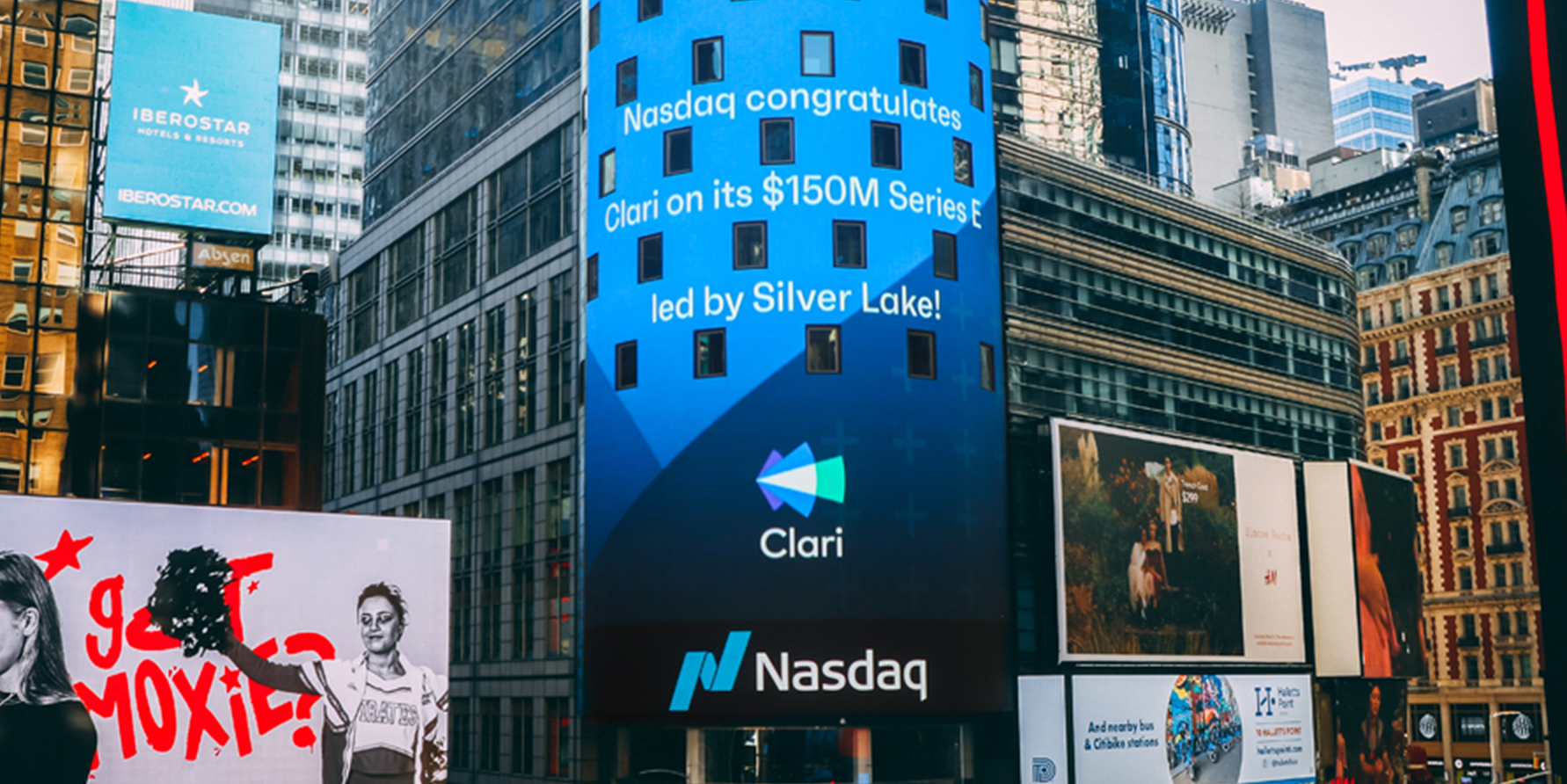 Photograph of Nasdaq message in New York City saying Nasdaq congratulates Clari on its 150M Series E led by Silver Lake