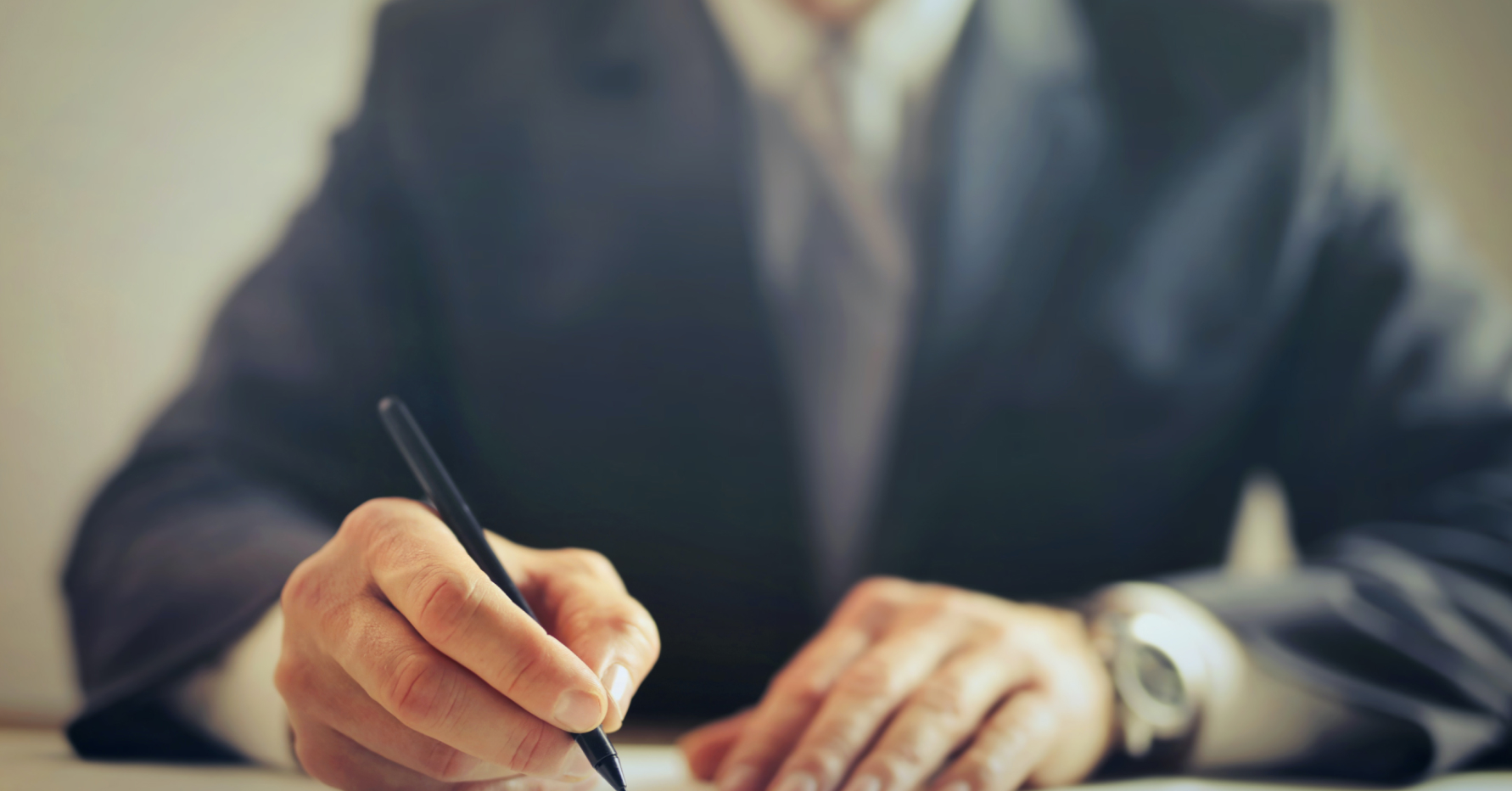 Man writing on paper