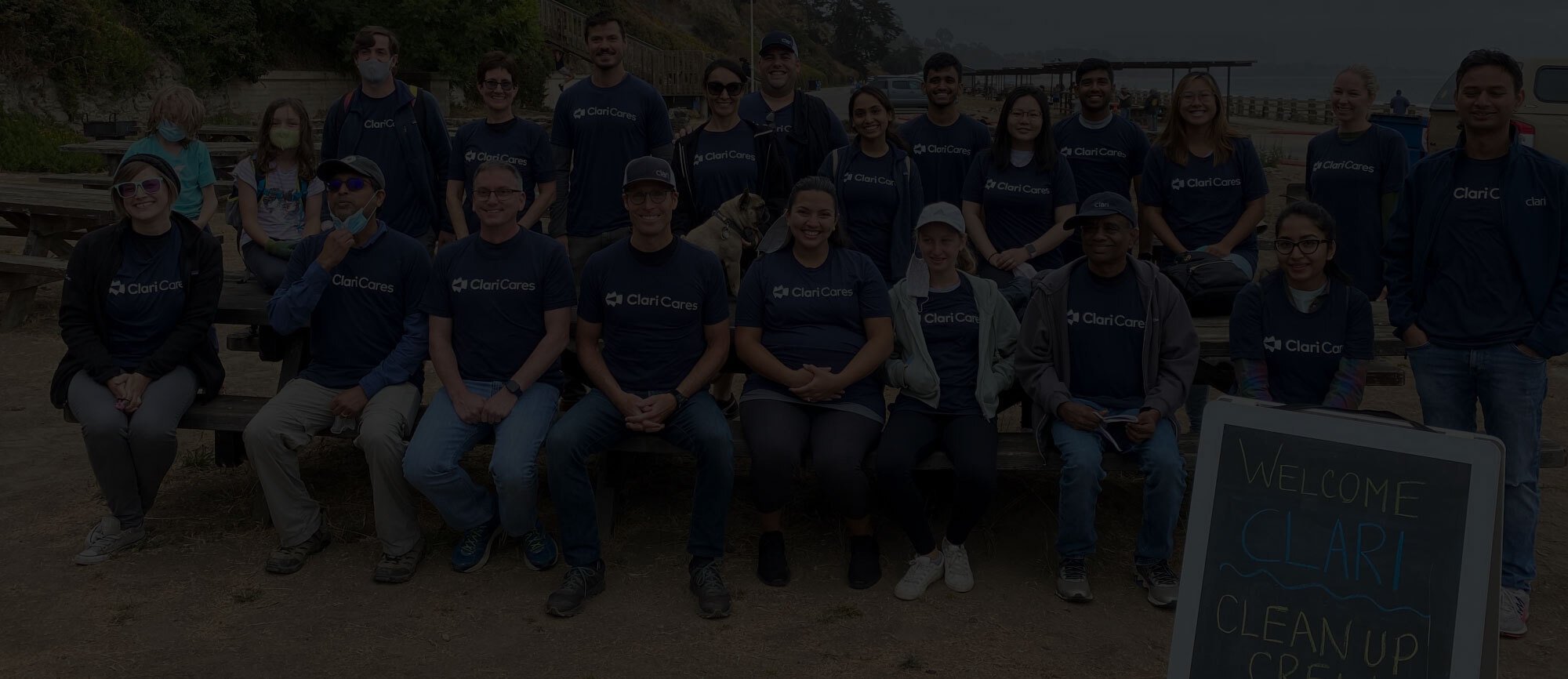 Photograph of Clari employees at the beach for a community service event